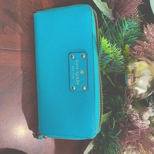 A beautiful Kate spade green wallet